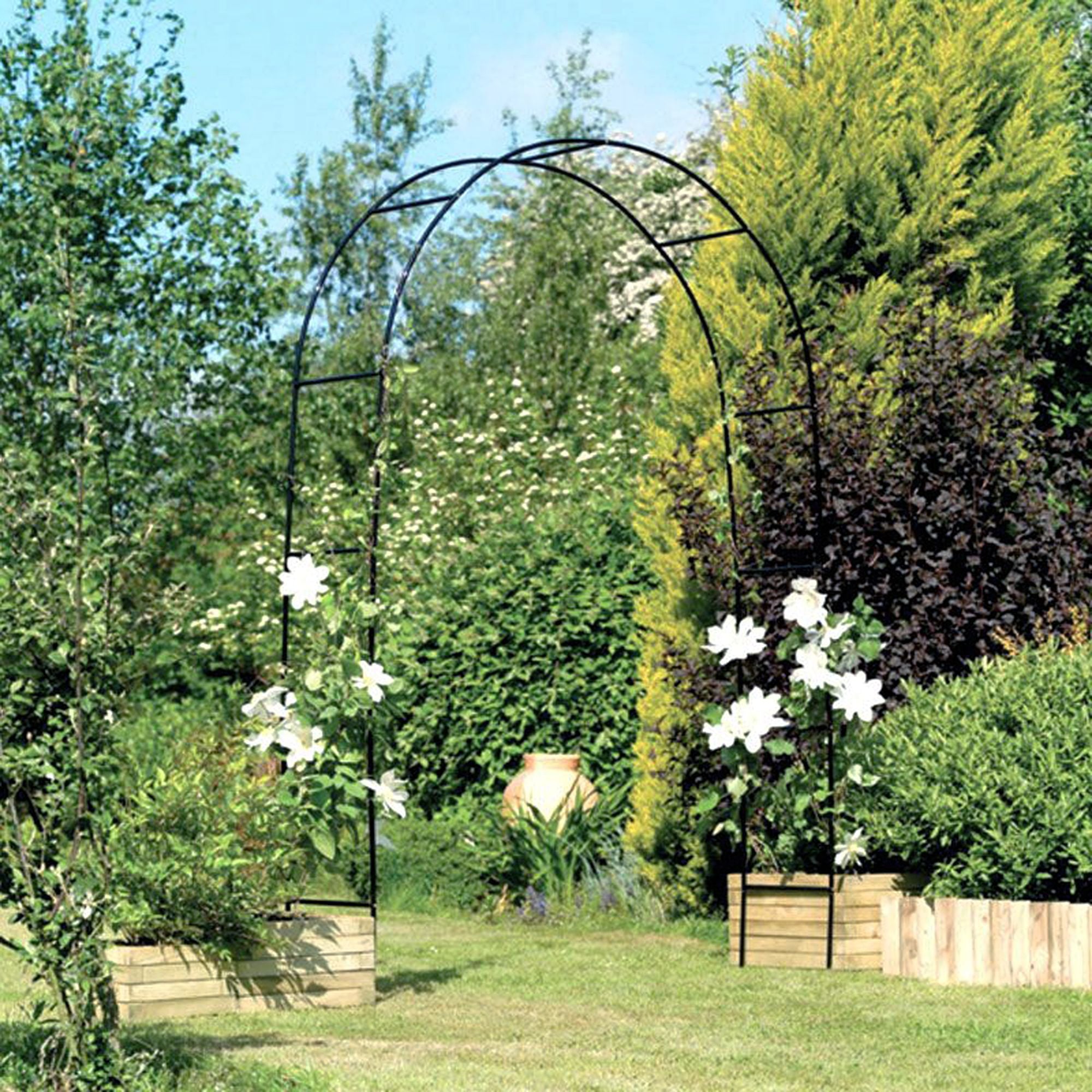Dark Green Adjustable Garden Arch Trellis Used With Planters to Grow Flowers Over the Arch