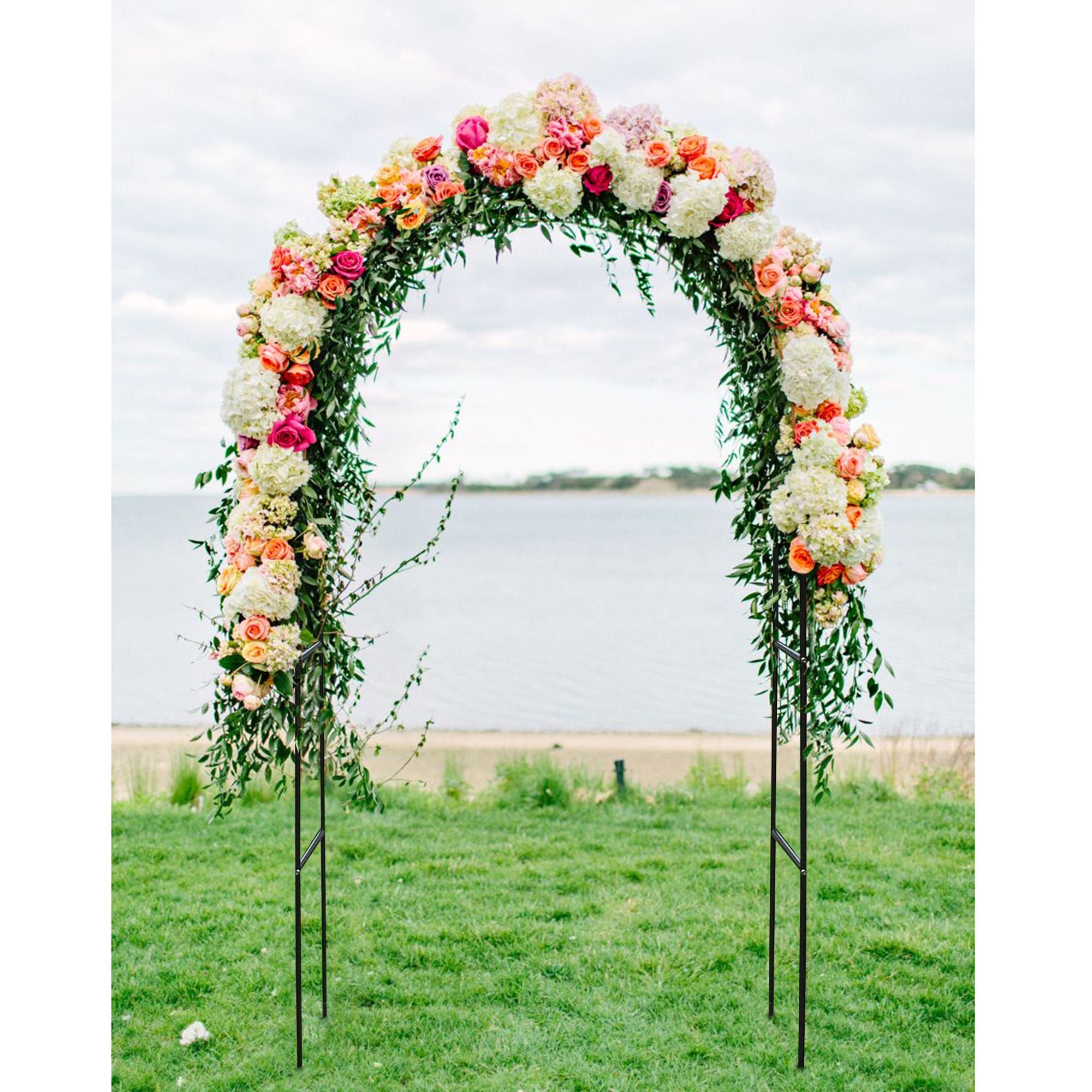 Dark Green Adjustable Garden Arch Trellis Covered in Flowers in a Garden Setting