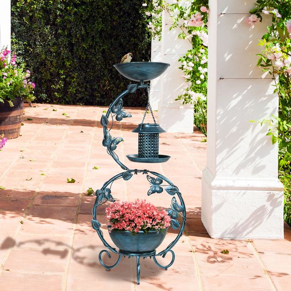 Bird Bath with Solar Bird Feeder and Planter Pedestal On A Patio With Pink Flowers