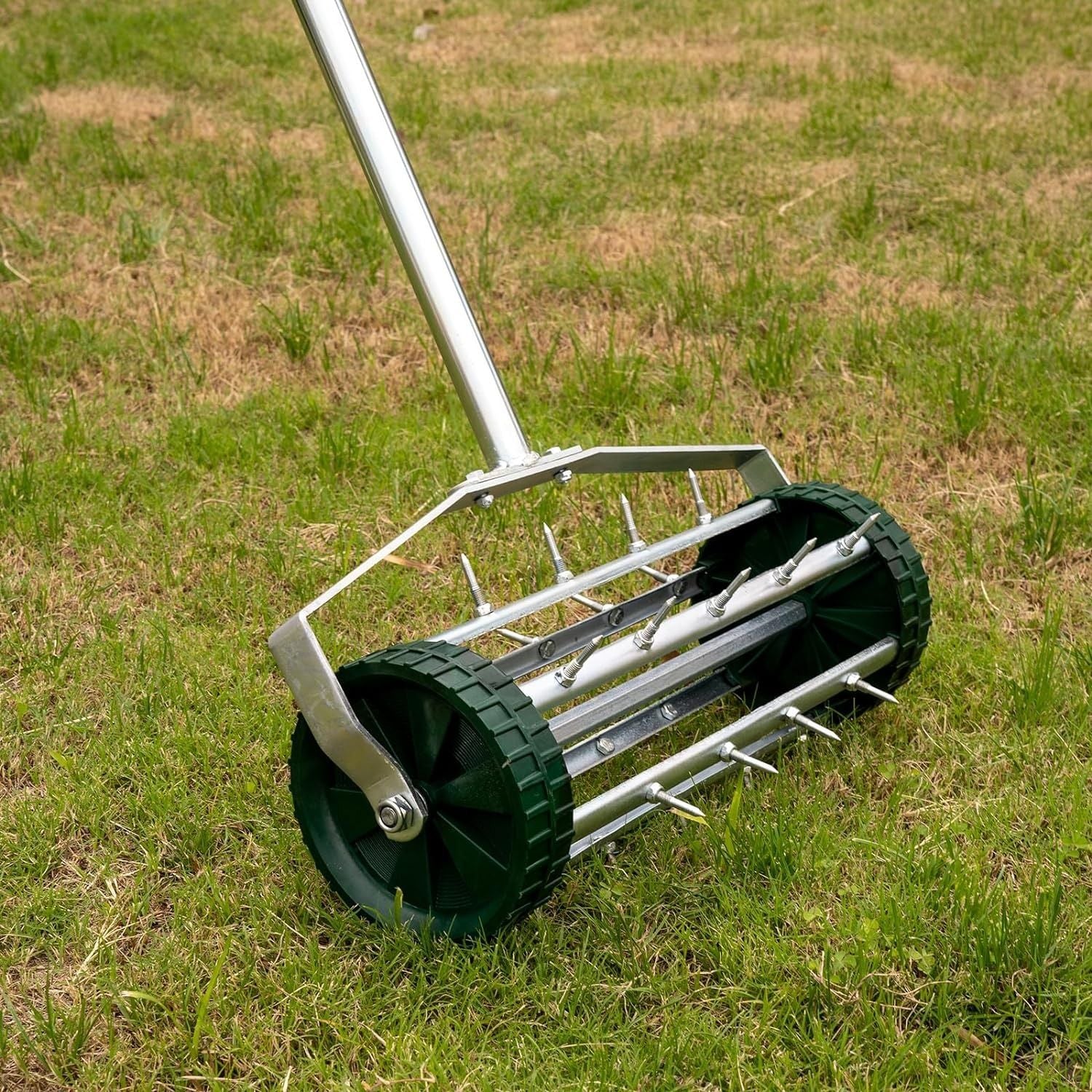 Heavy Duty Rolling Lawn Aerator On A Lawn