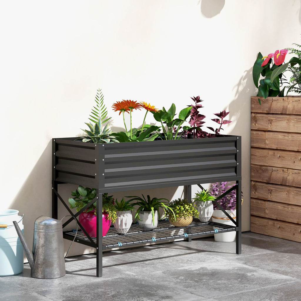 Black Galvanized Raised Garden Bed On Patio With Different Flowers & Pots
